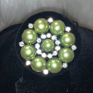 Green beads with diamonds brooch